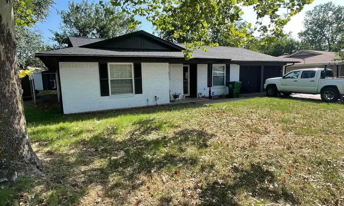 Professional roofing crew working on a residential roof in Orcutt